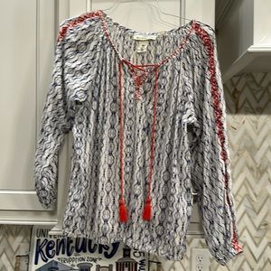 Embroidered long sleeve peasant top
